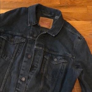 Men’s washed black denim jacket.
